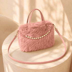 Pink Women’s elegant faux fur crossbody handbag with golden buckle and chain strap.