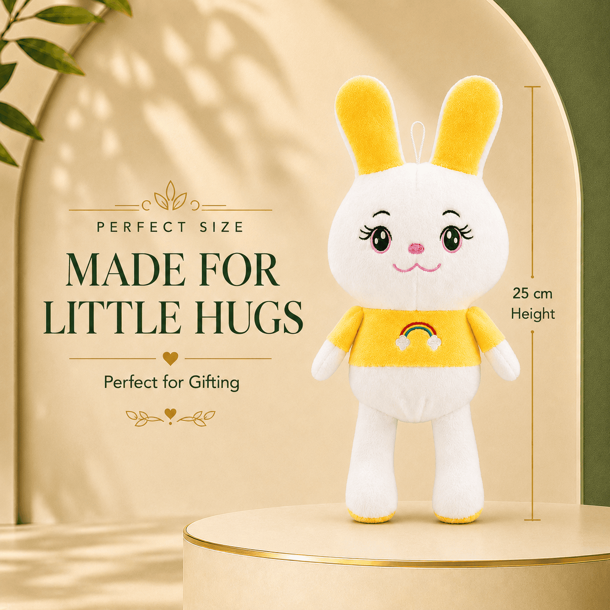 25cm white plush bunny wearing a yellow rainbow sweater on a beige display pedestal.
